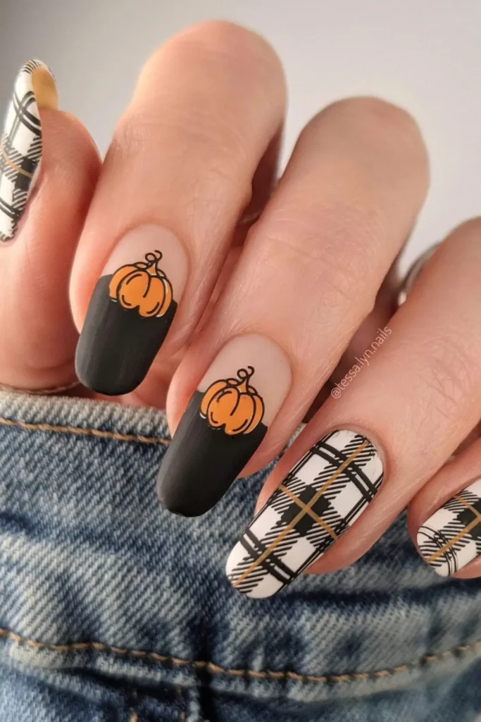 Long square nails with plaid fall nail art in neutral tones.