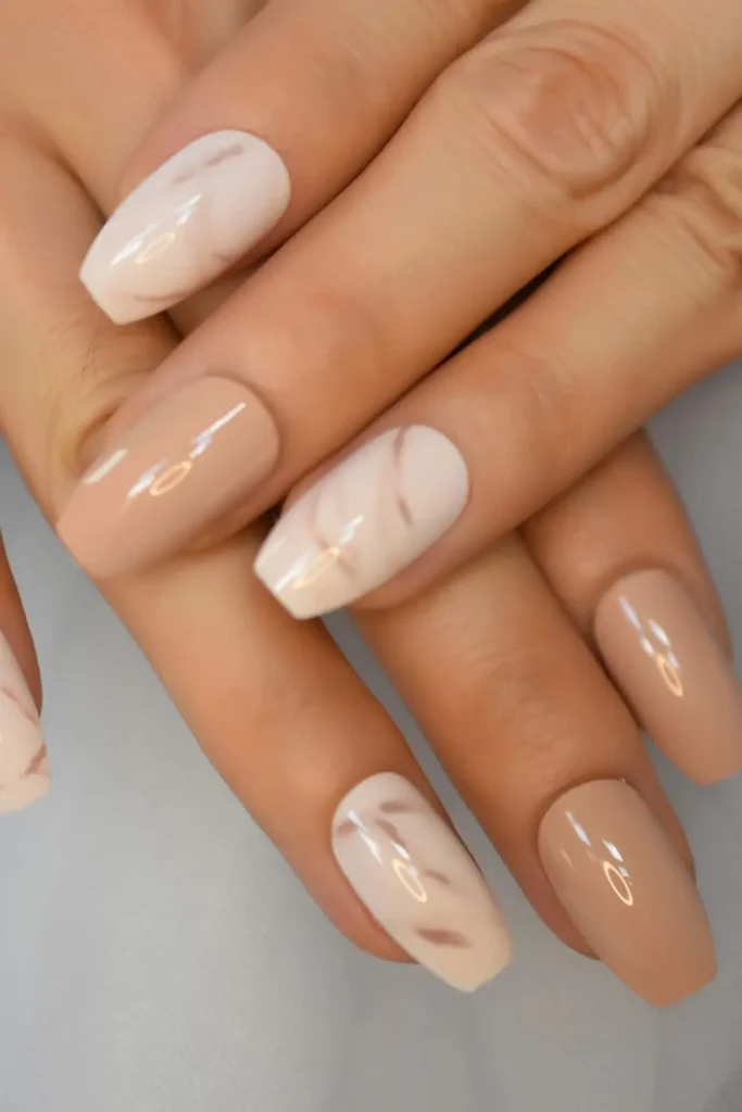 Long nails with mocha and cream marble design