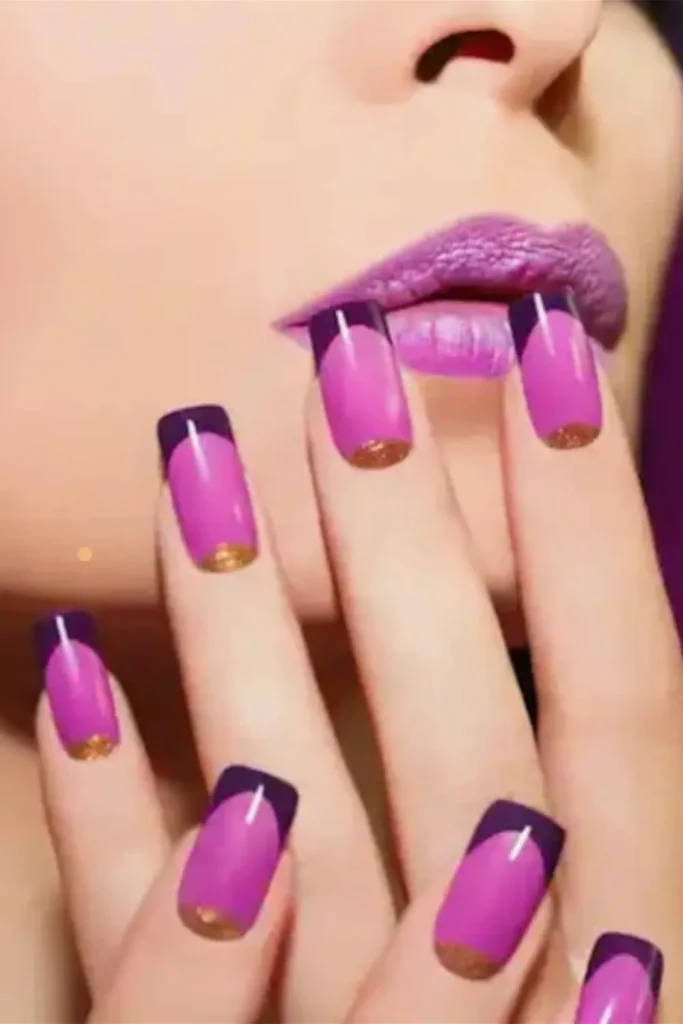 A close-up of vibrant purple and pink nail art with gold glitter, demonstrating how to grow nails fast by maintaining a strong square shape.