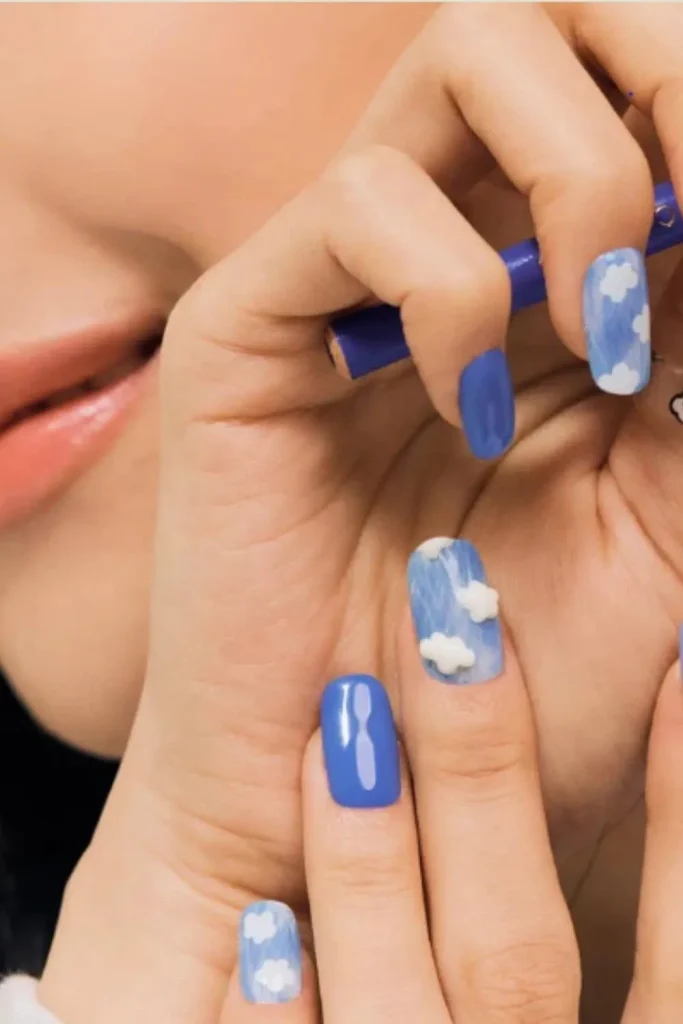 Gentle Cuticle Care Guide featuring a close-up of healthy nails with blue sky and 3D cloud nail art.